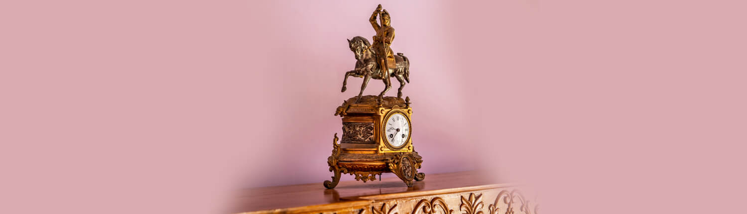 100-year-old antique mantel clocks displayed throughout, adding a touch of history to your destination wedding in Hyderabad.