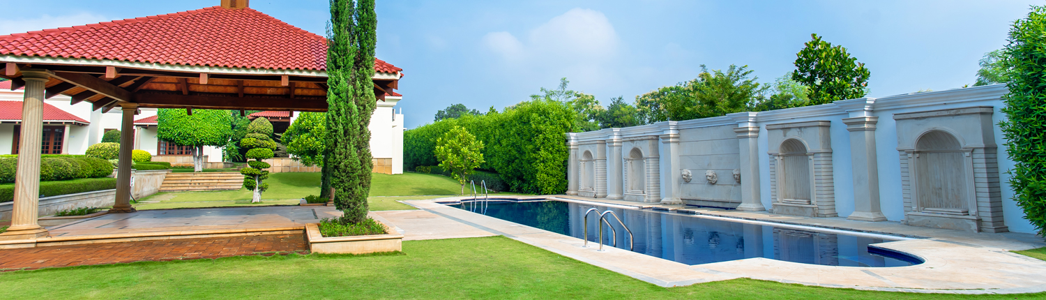 European-inspired pool and gazebo at Rajkamal Palace, an enchanting setting for destination wedding places.