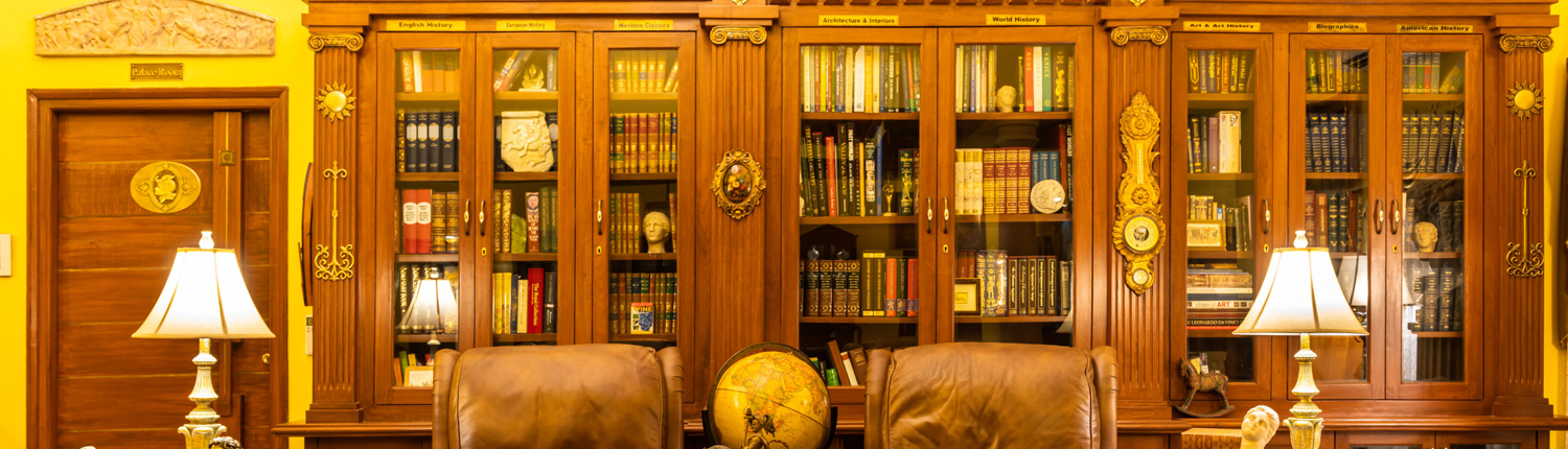 Neoclassical-style living room with a private library, an elegant addition to luxury wedding venues.