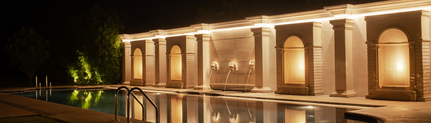 Perfectly lit to set the mood for any poolside party, adding charm to wedding venues outside.