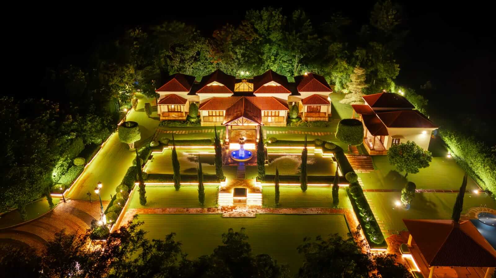 Roman-inspired grand entrance gate at Rajkamal Palace, a majestic choice for destination wedding venues.