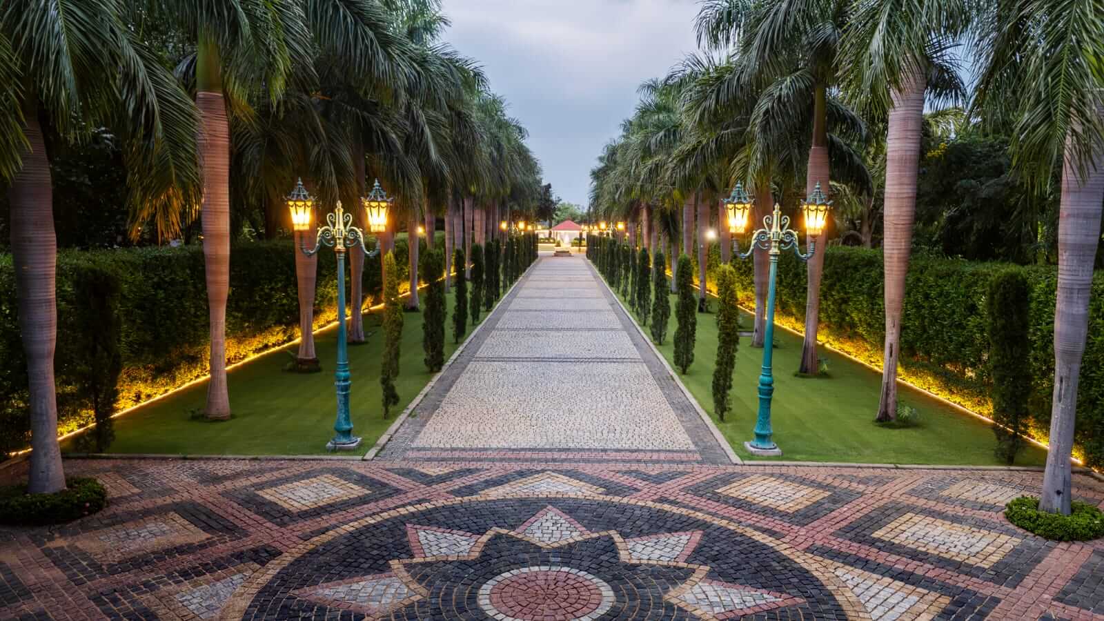 Main lawn featuring English & European formal garden styles, an ideal setting for destination wedding places.