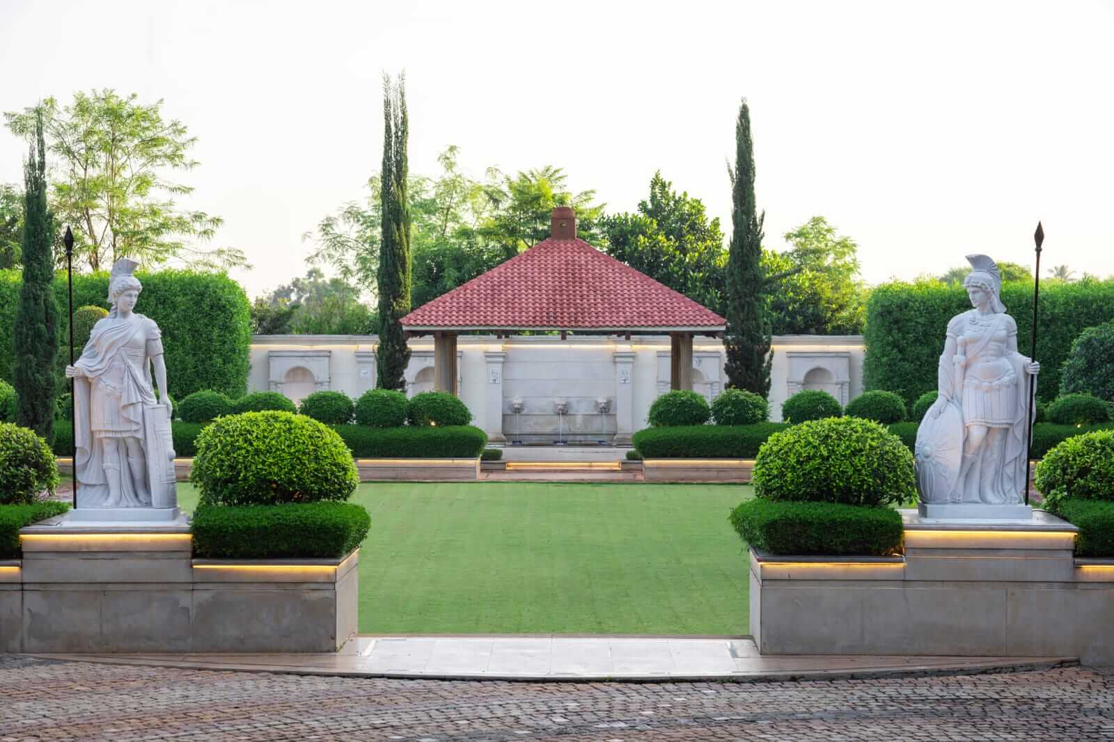 Main lawn featuring English & European formal garden styles, an ideal setting for destination wedding places.